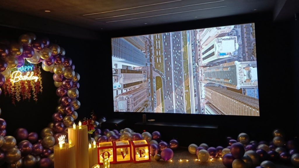 an image showing a premium private theatre in Hyderabad which costs just 1499 rs with 4k Dolby, food, & custom decor.